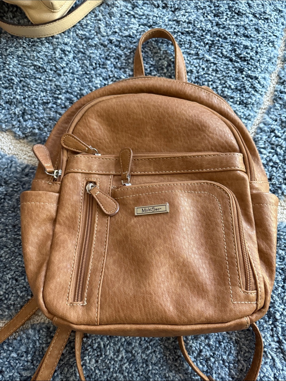 Gently Used..Tan Leatherette Mini Backpack